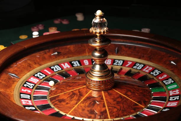 wnibet Bigger Bass Bonanza slot game interface showing reel grid and payout table